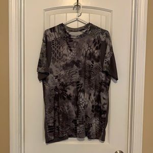 Huk short sleeve Kryptek camo shirt.